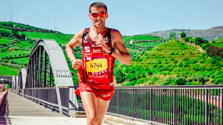 Male Runner Wearing Jersey With Bib Number 4744