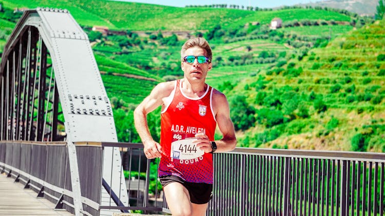 Man Running On Bridge