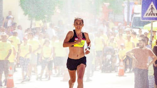 Free Woman Running Marathon Stock Photo