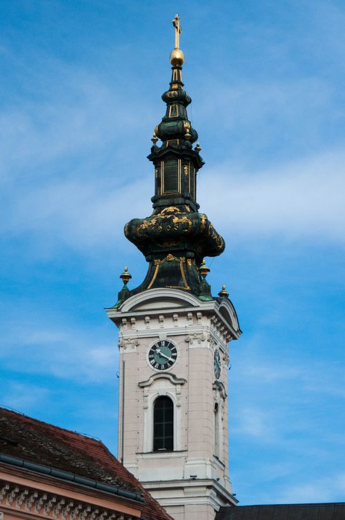 Free Stunning vertical view of Saint George's Cathedral tower in Novi Sad, Serbia against a clear blue sky. Stock Photo