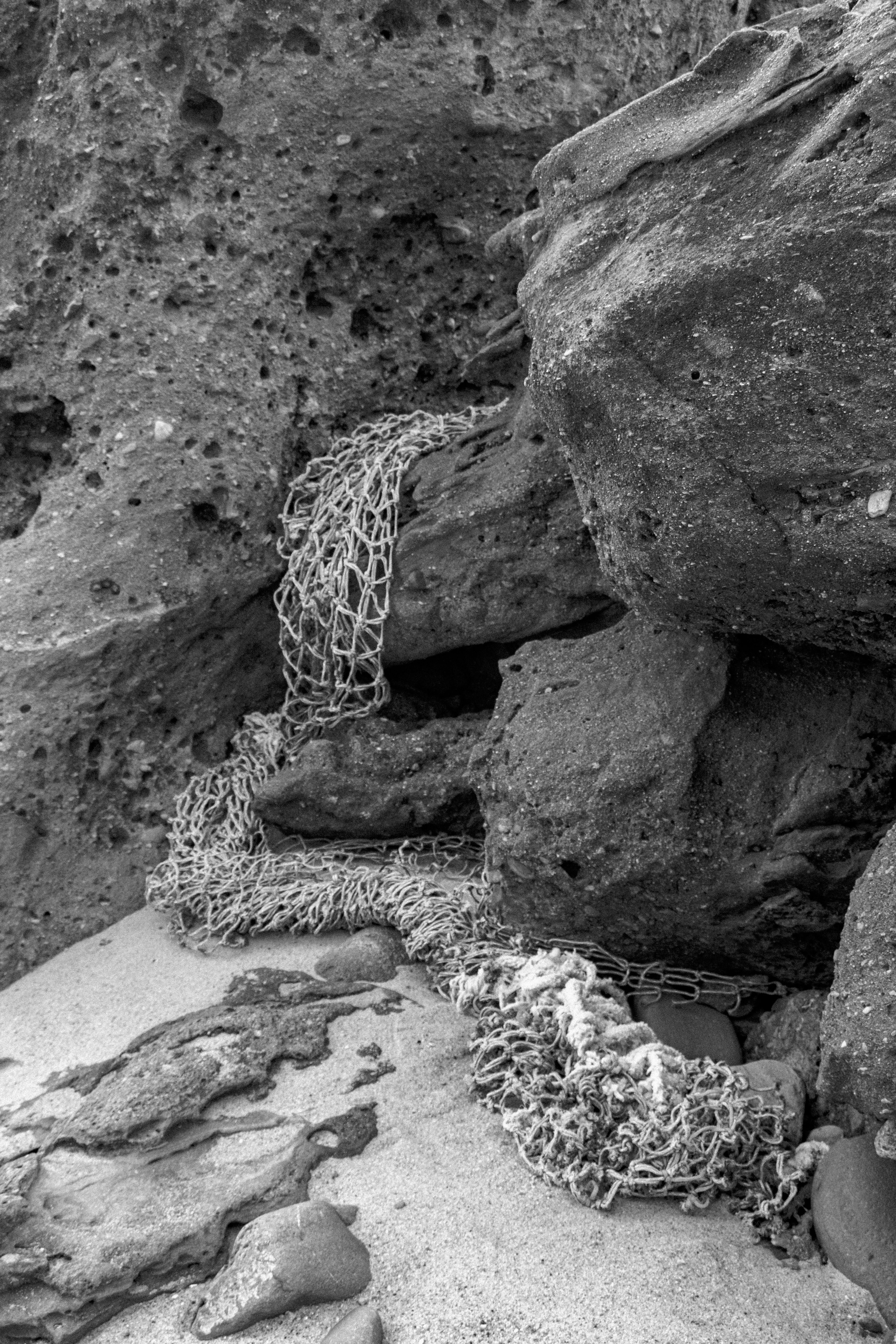 Fishing Net on Rock at Beach · Free Stock Photo