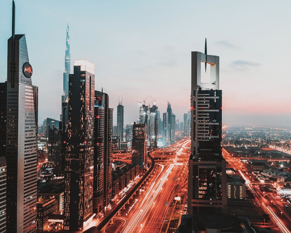 Free Time-lapse Photography of Passing Vehicles on City Roads Stock Photo