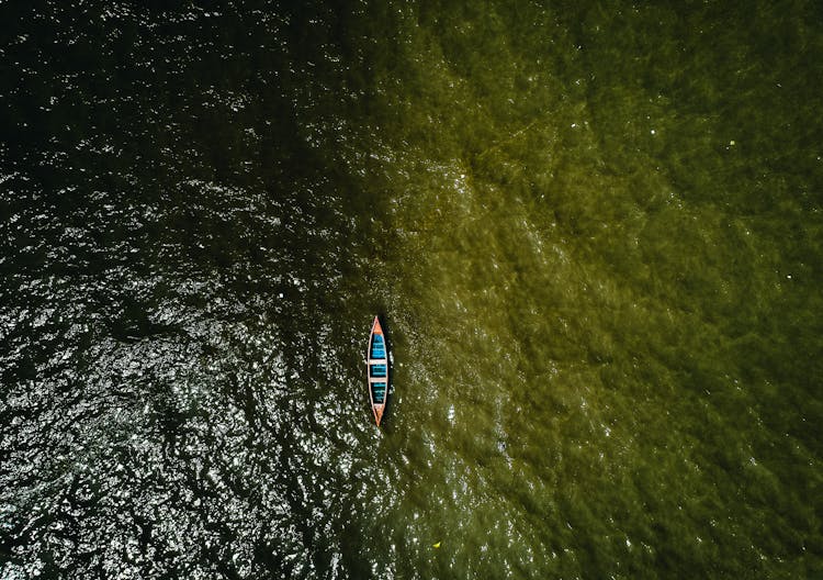 Aerial View Of Boat On Body Of Water