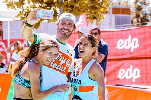 Man Taking Photo With Two Girls