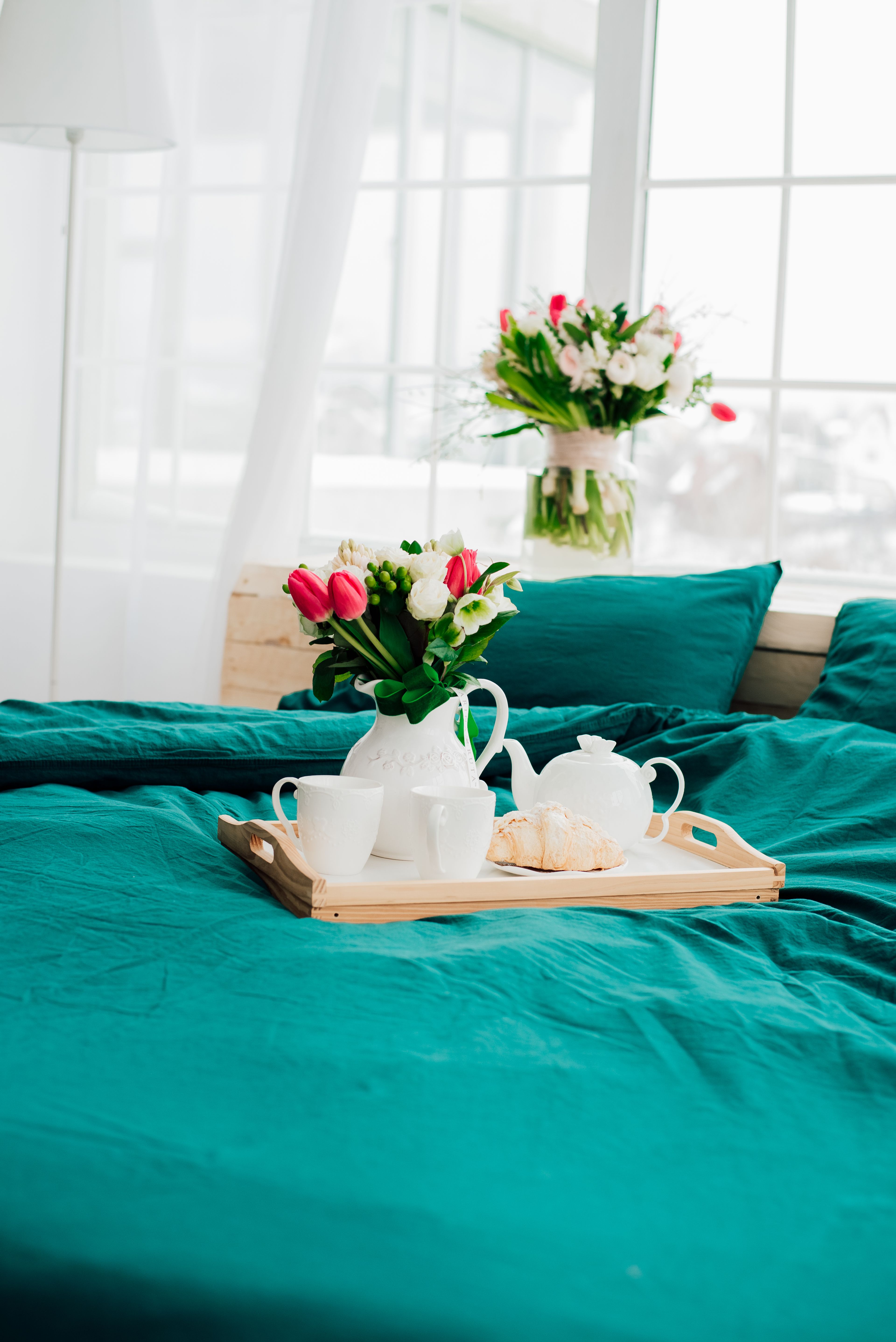 The library room, flowers and tea on the tray