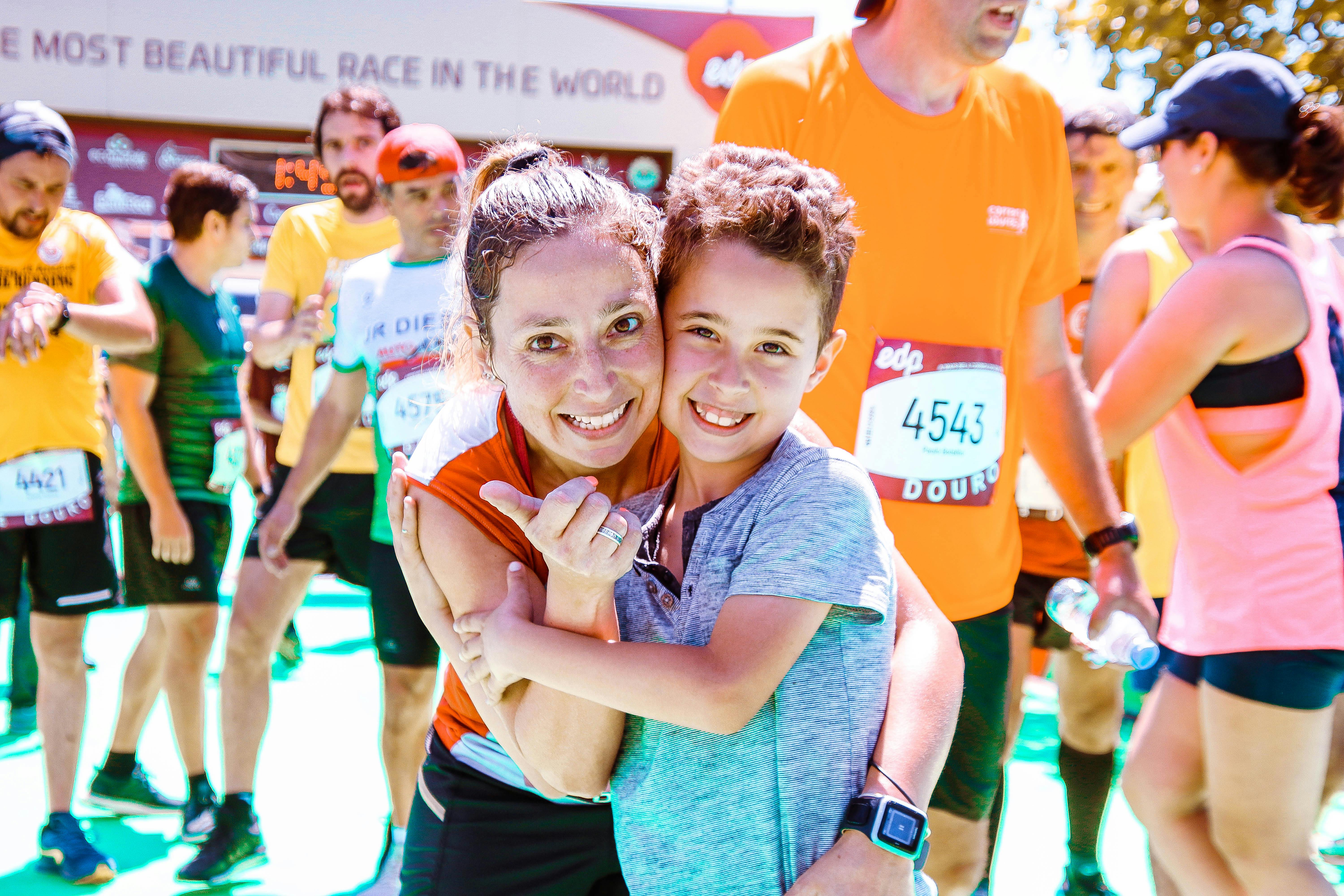 Photo of Woman Hugging Her Son