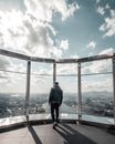 Man Standing on Building Top