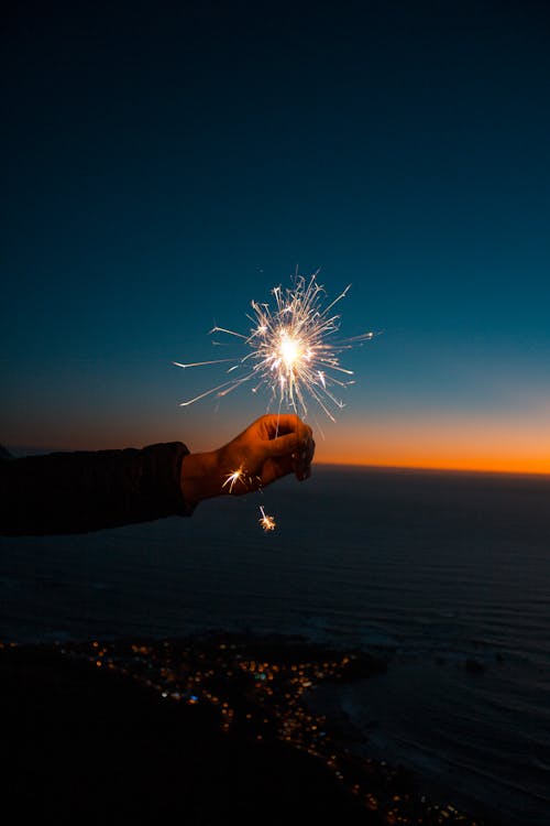 Person Holding Sparkler