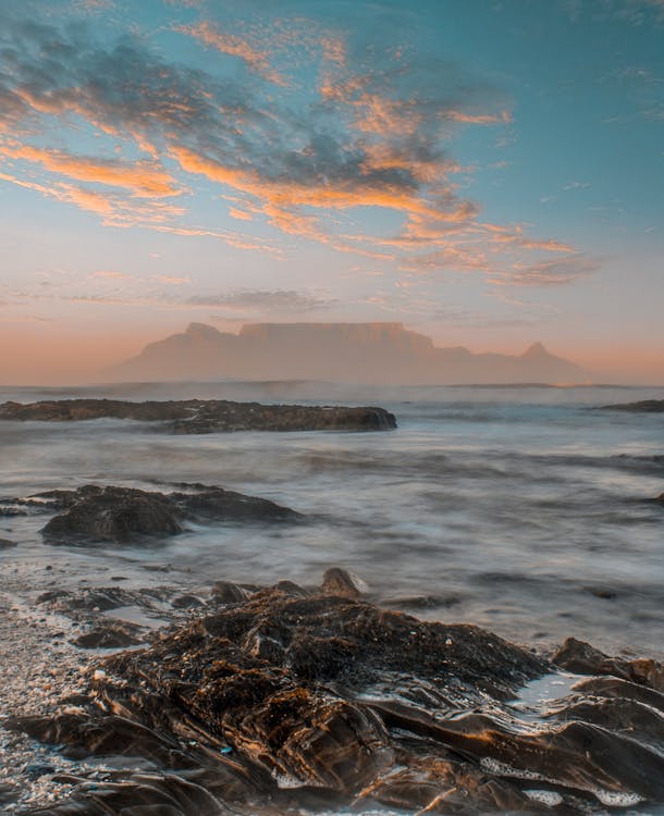 Body Of Water With Sunset View