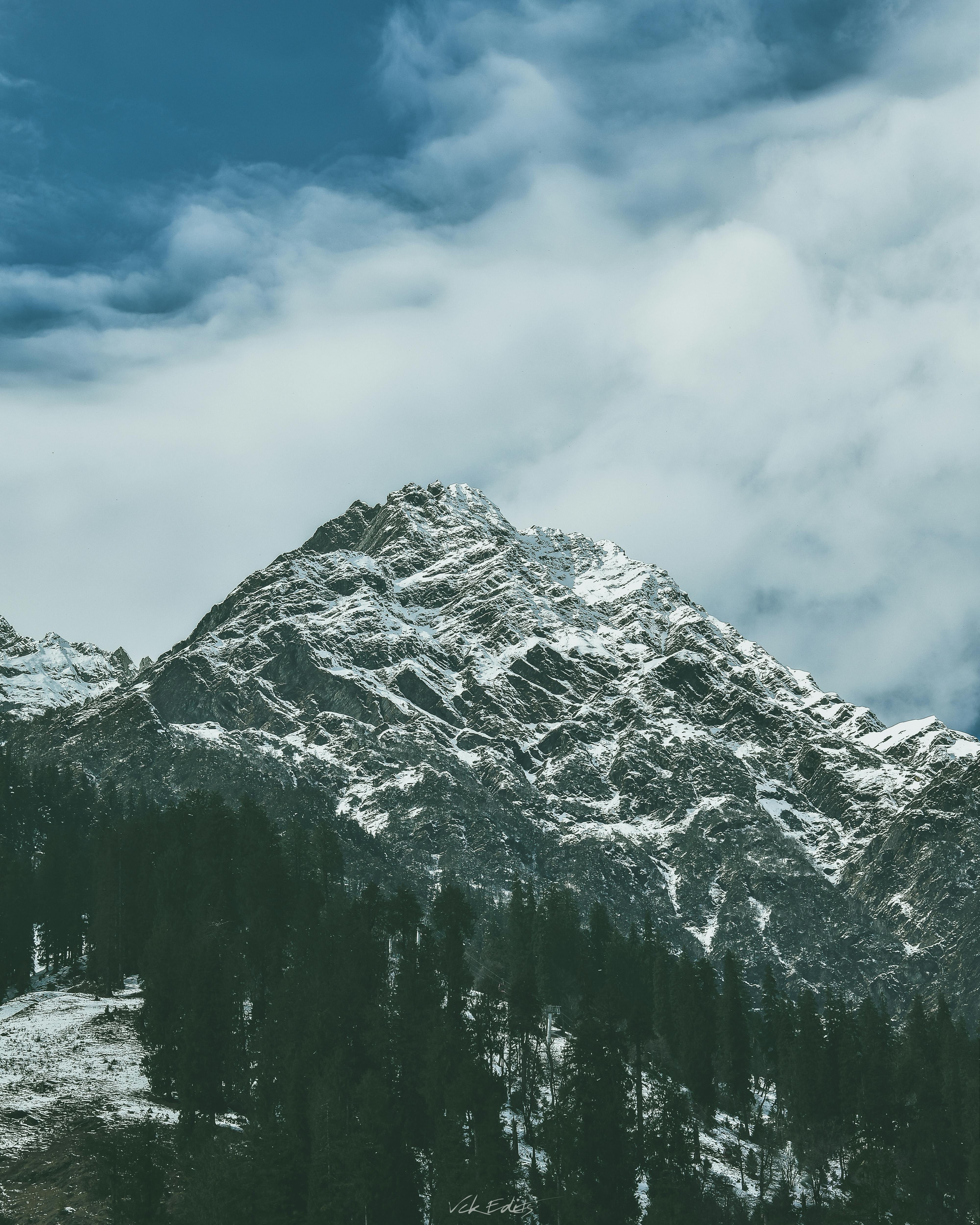 Snow Covered Rocky Mountain · Free Stock Photo