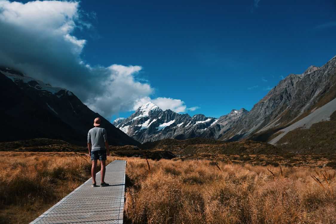Free Person Looking at Snow Covered Mountain Stock Photo