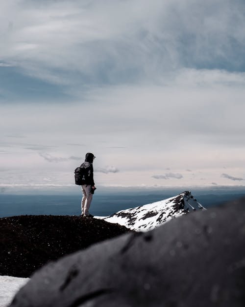 Photo of Person Wearing Backpack