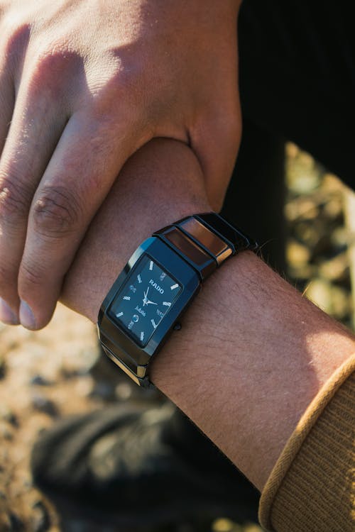 Free Person Wearing Black Watch at Right Wrist Stock Photo