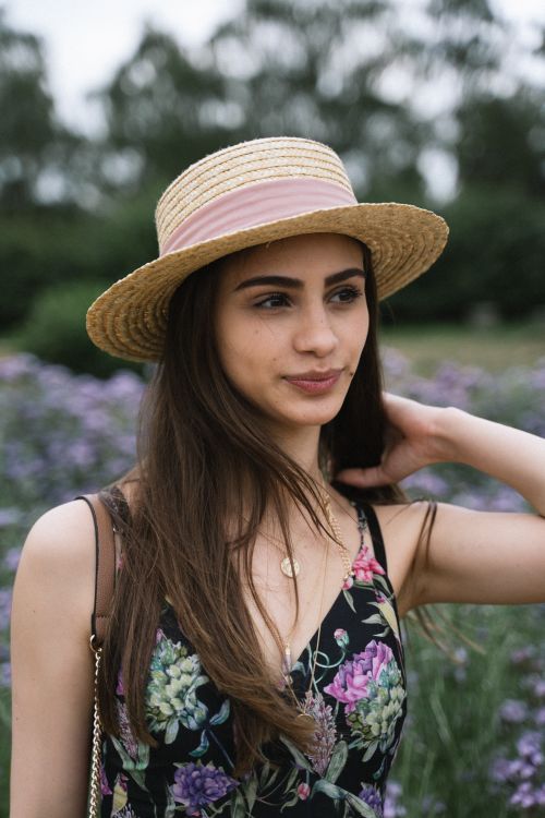 Selective Focus Portrait Photo of Woman in Sun Hat and Floral Dress ...