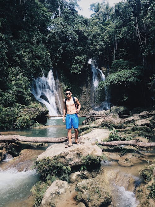 Man Standing on Rock