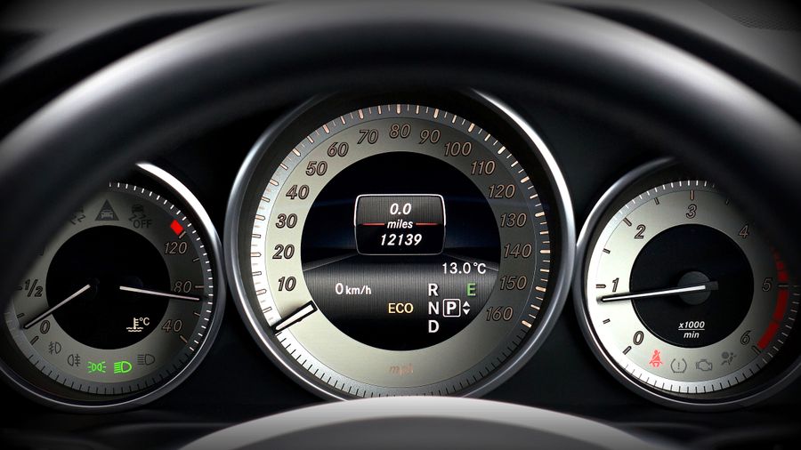 A car instrument cluster showing the odometer mileage reading