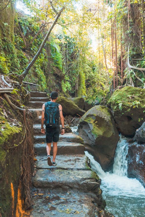 Man Walking Near Outdoor Beside River