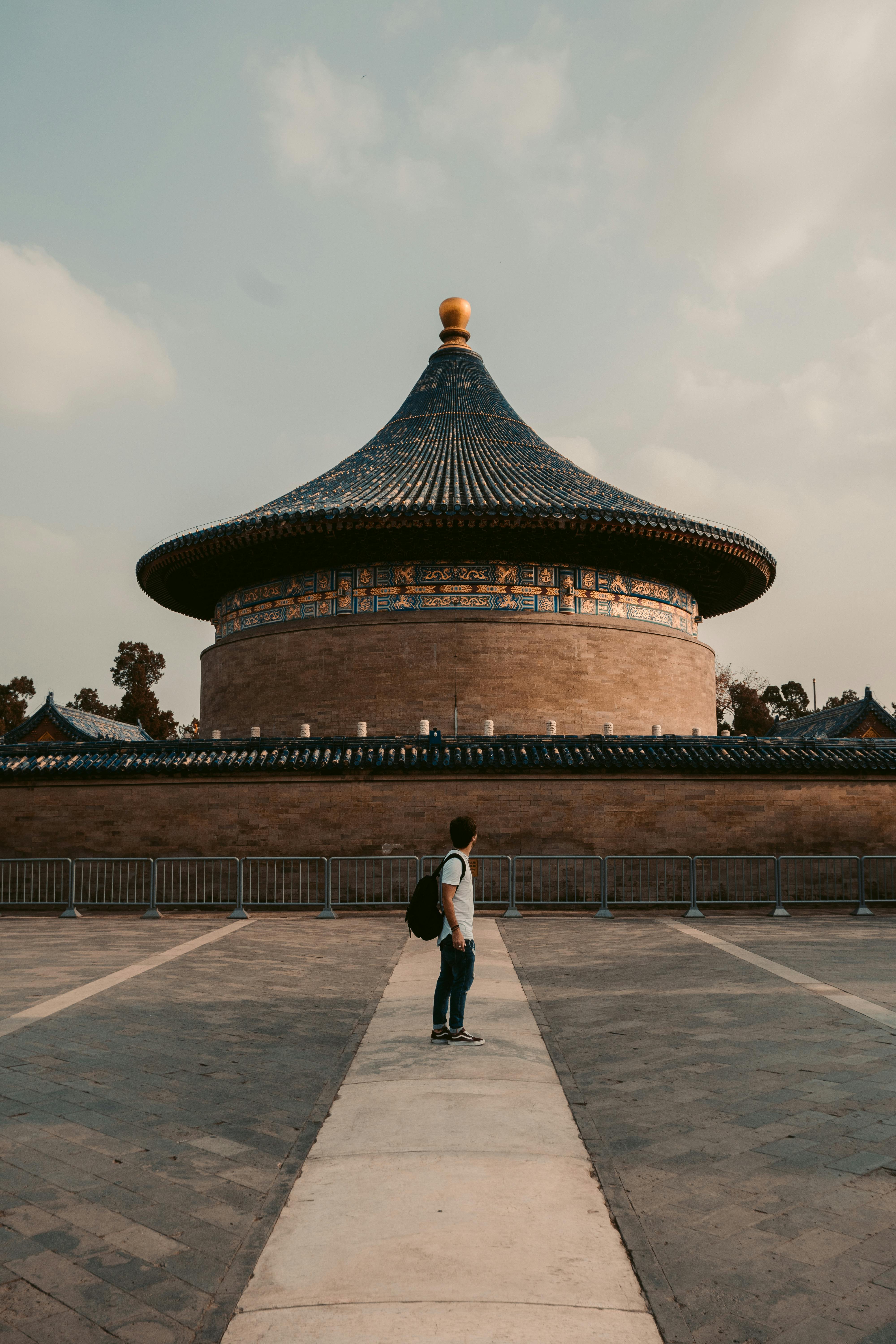 photo of man wearing backpack