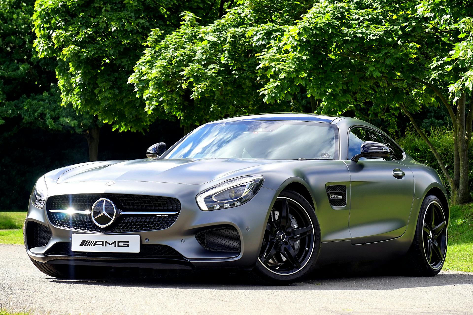 Elegant Mercedes Benz AMG parked outdoors, showcasing luxury and style.