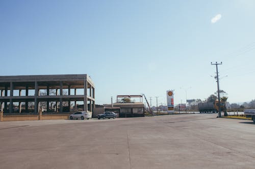 Kostnadsfri bild av arkitektur, bensinstation, betong