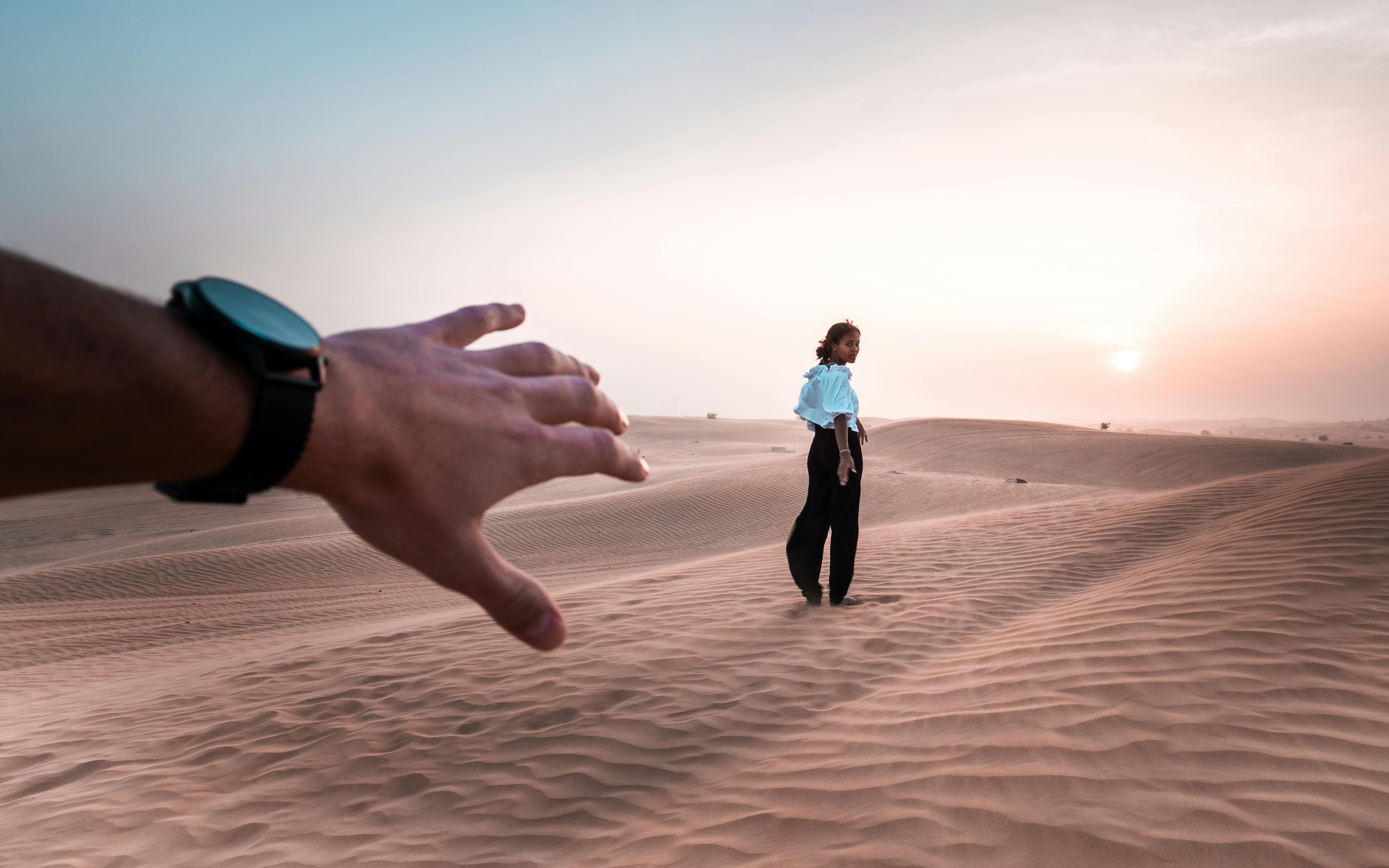 Woman Walking on Sand · Free Stock Photo