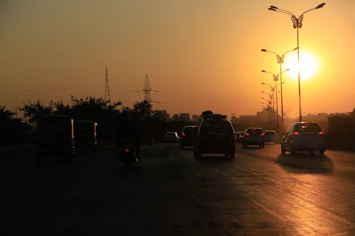 Δωρεάν στοκ φωτογραφιών με αυτοκίνητα, δρόμος, δύση του ηλίου