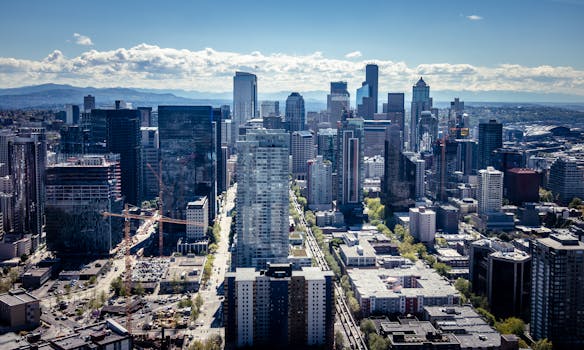 Captivating aerial view of the Seattle skyline, showcasing iconic skyscrapers and urban landscape.