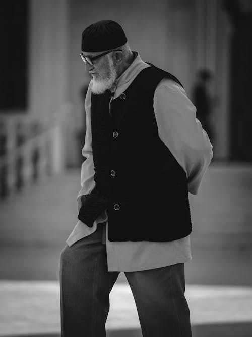 Selective Focus Photography Of Man Standing 