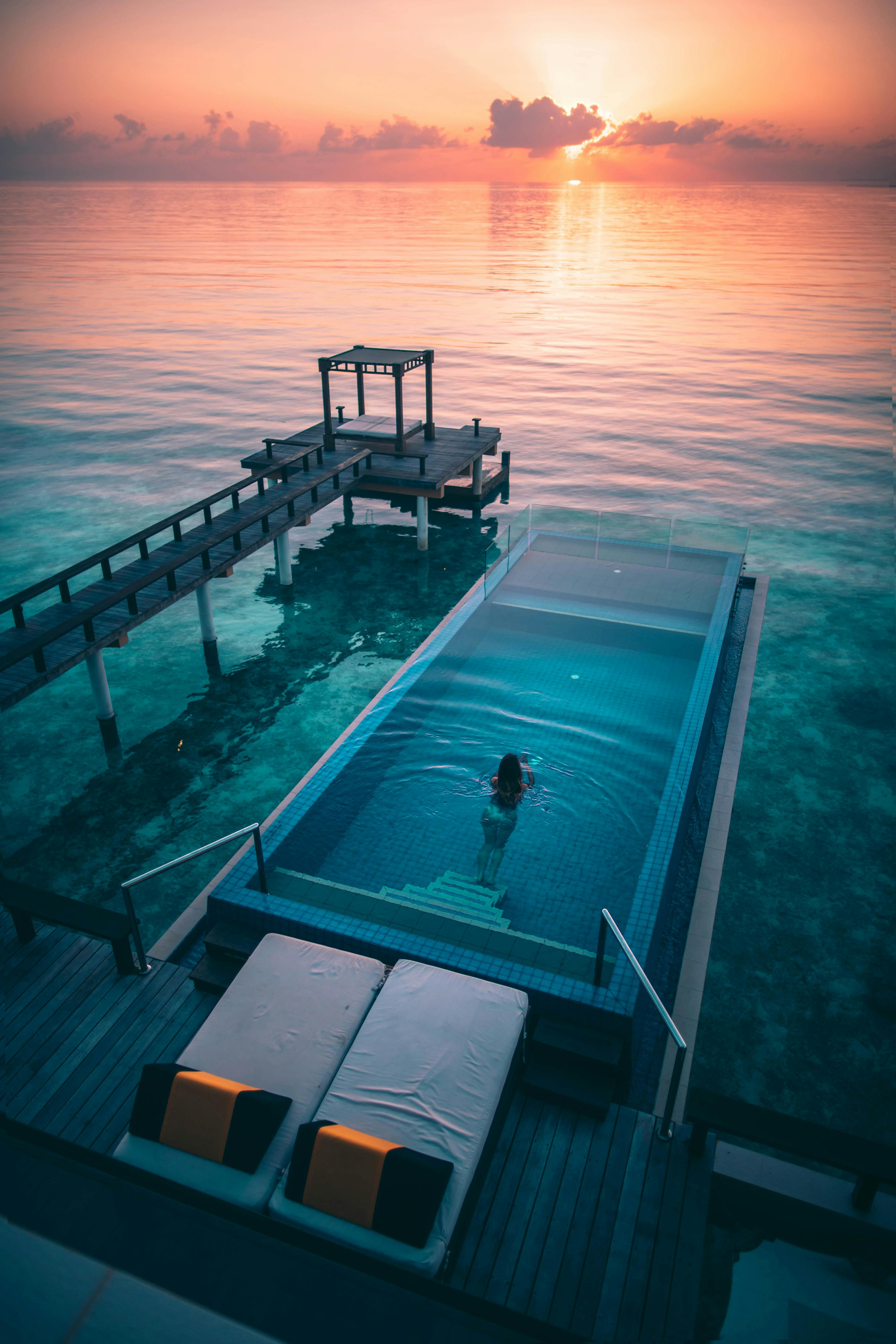 person swimming in pool