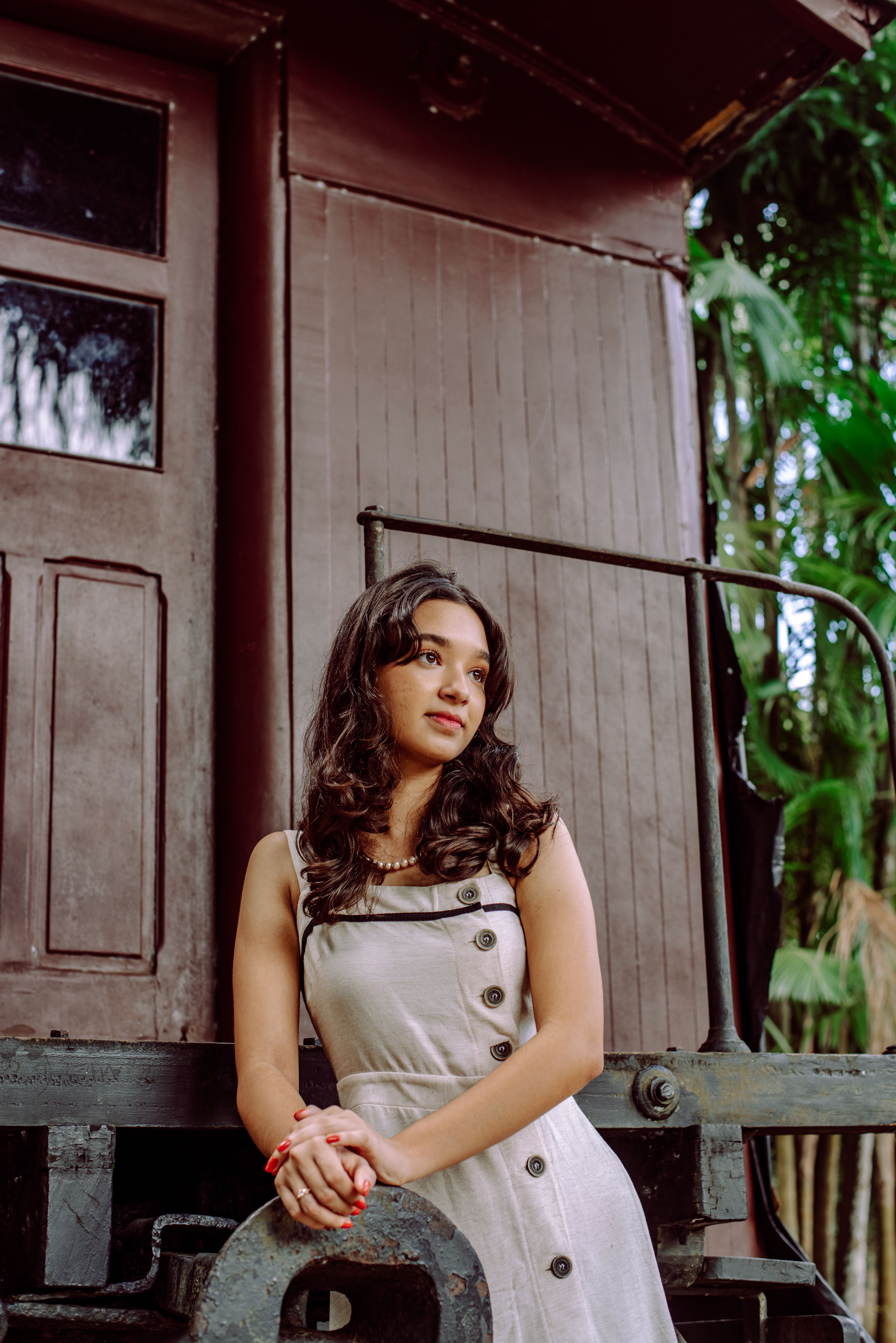 A Girl in a Dress Standing in Front of an Old Train Wagon · Free Stock ...
