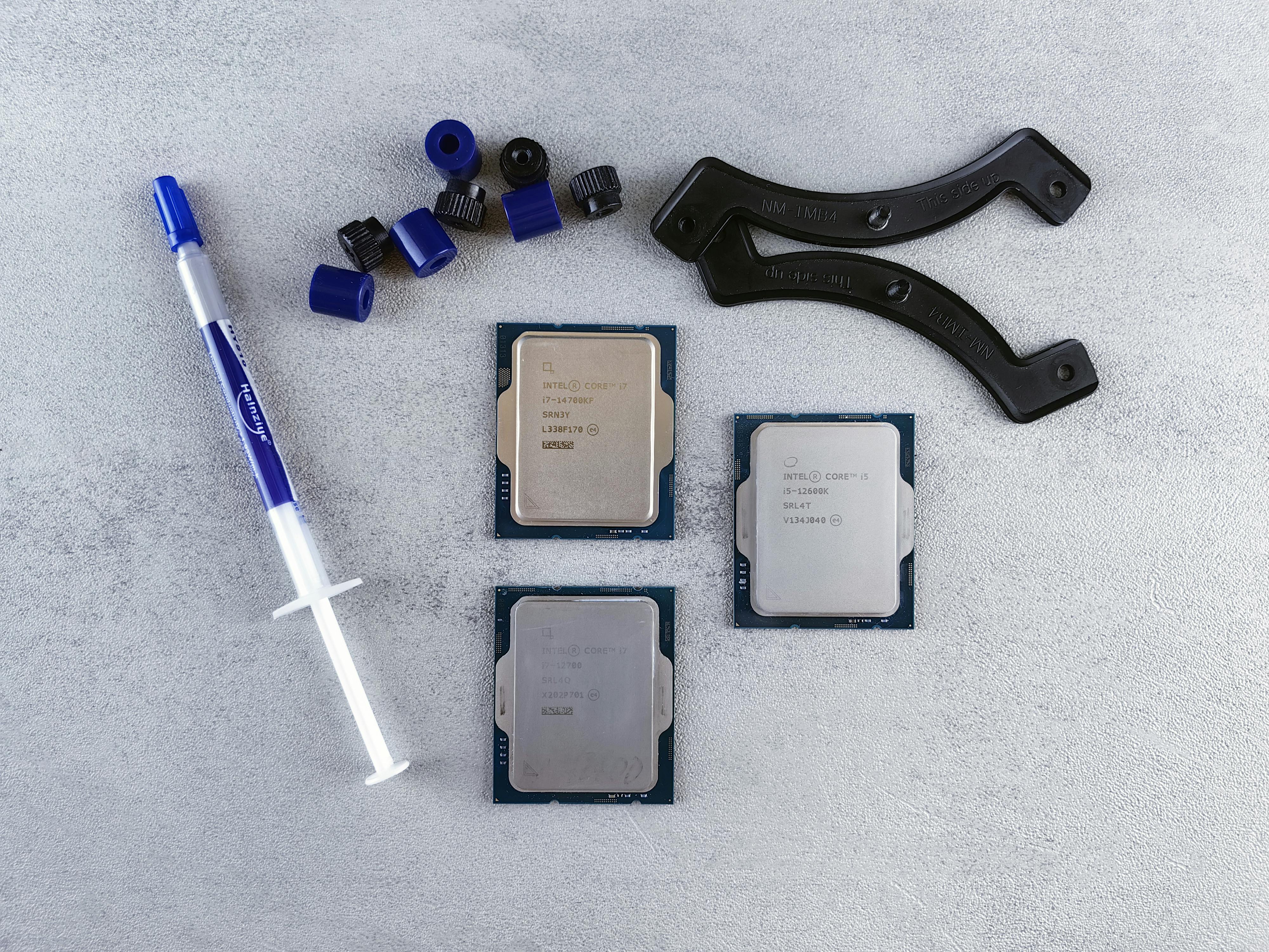 Intel core i9-9900k processor, cooler, and thermal paste · Free Stock Photo