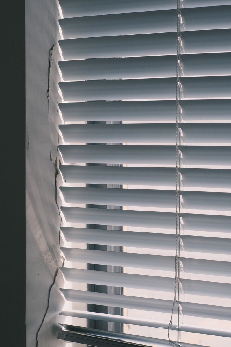 Roller blind fitted on a bright window