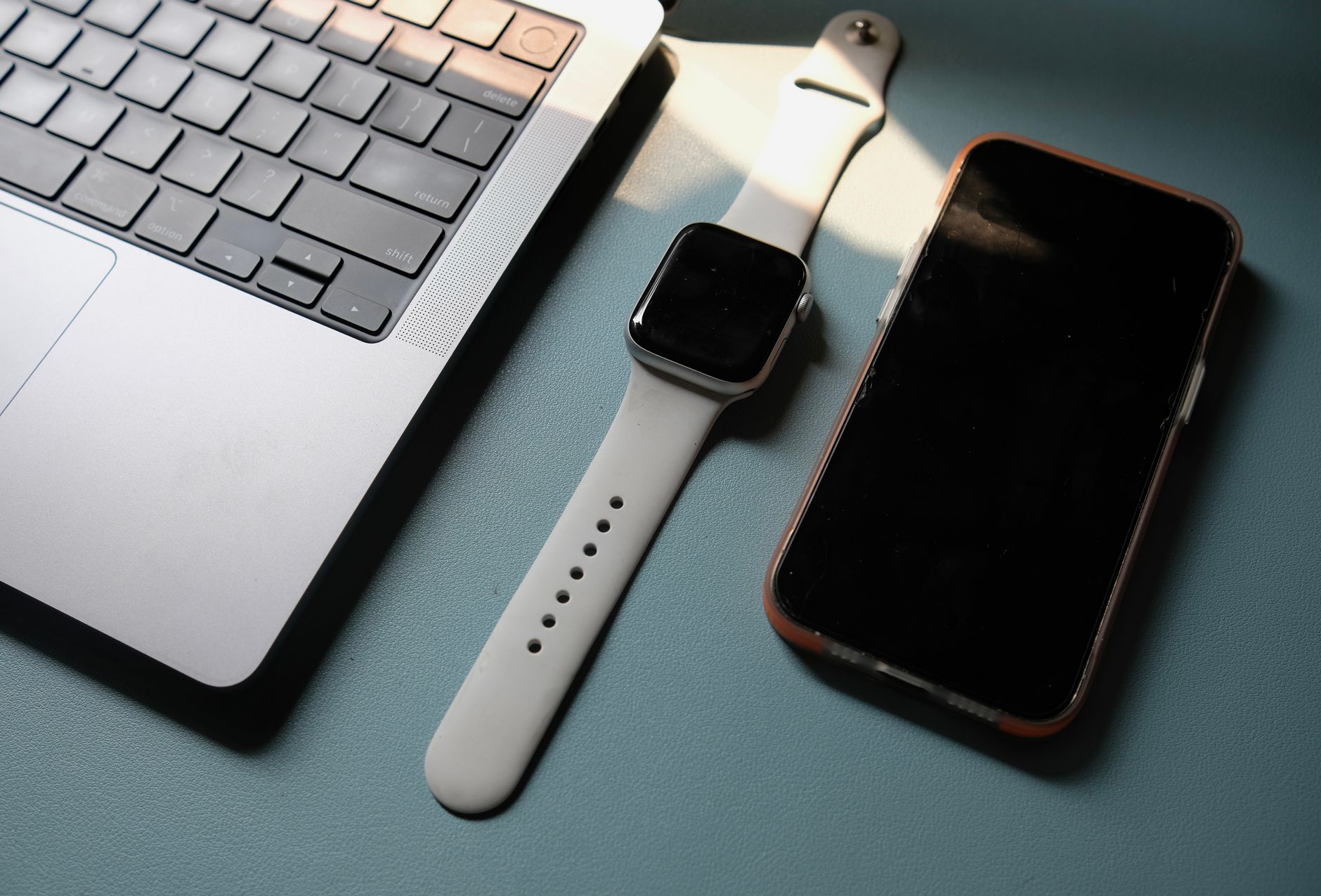 Smartwatch and phone with abstract interference waves