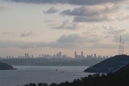 Landscape Photography of Body of Water Near Highrise Buildings