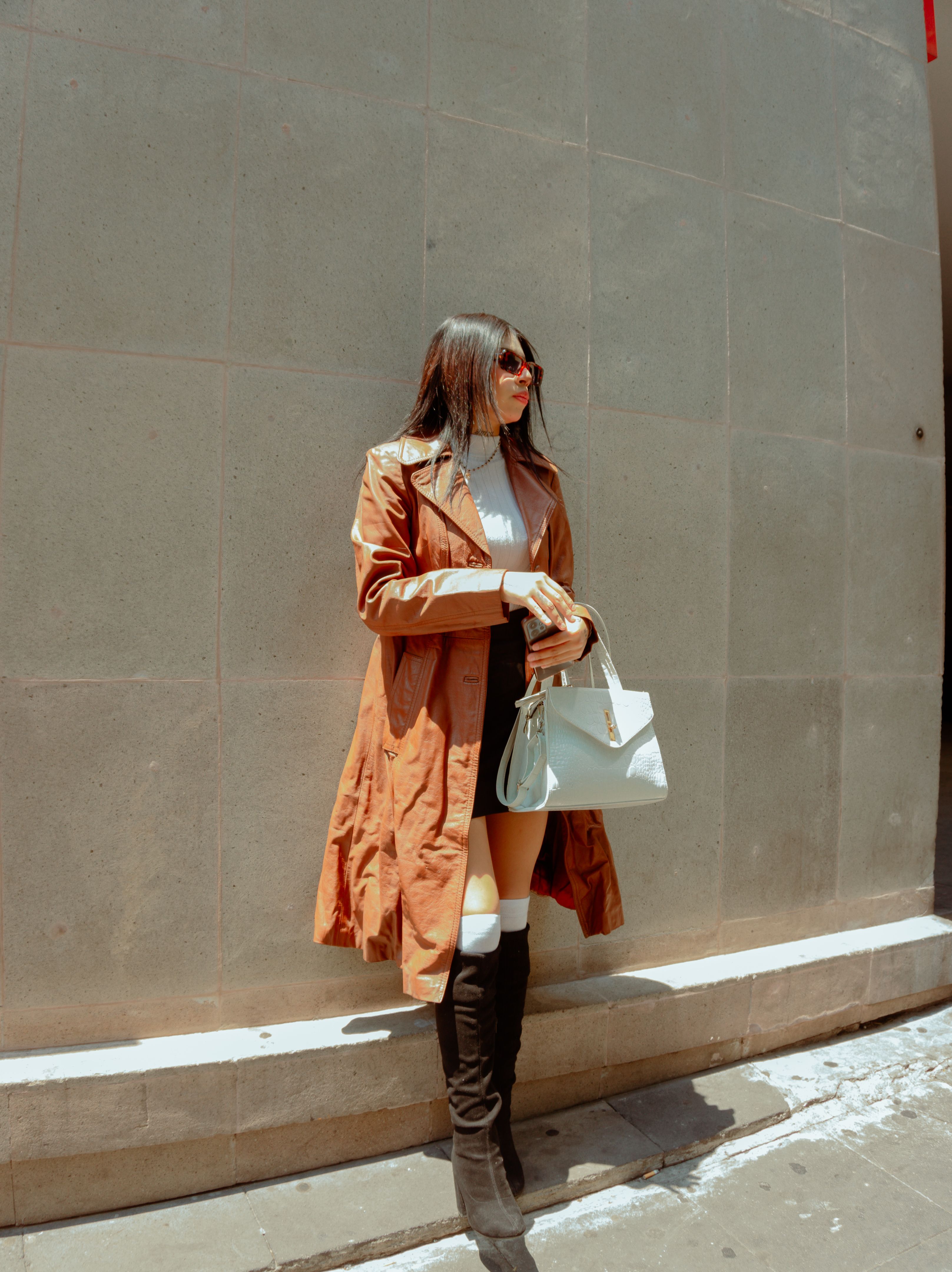 Brunette Woman Wearing Trench Coat on a Street · Free Stock Photo