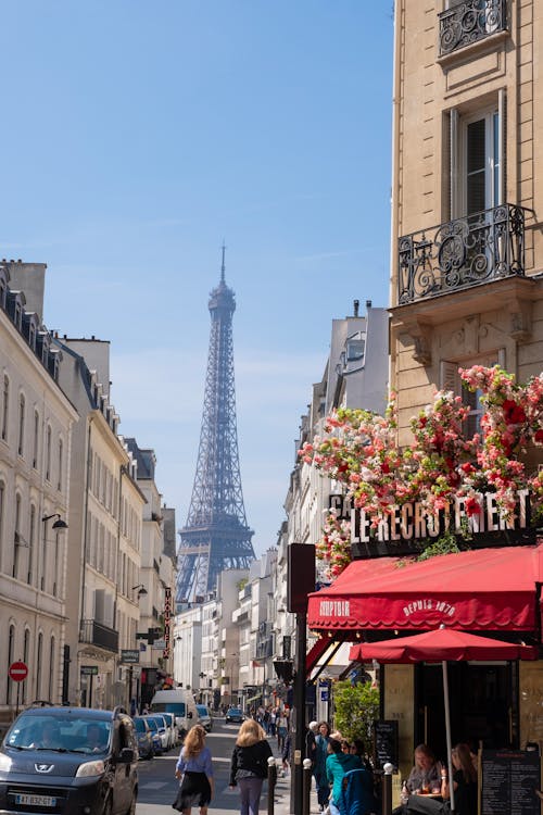 A view of the eiffel tower from a street in paris