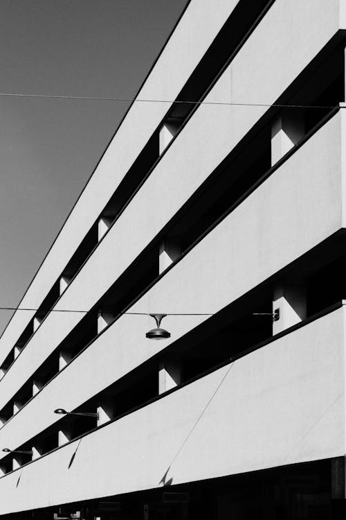 Free Architectural Photography of White and Black Building Stock Photo
