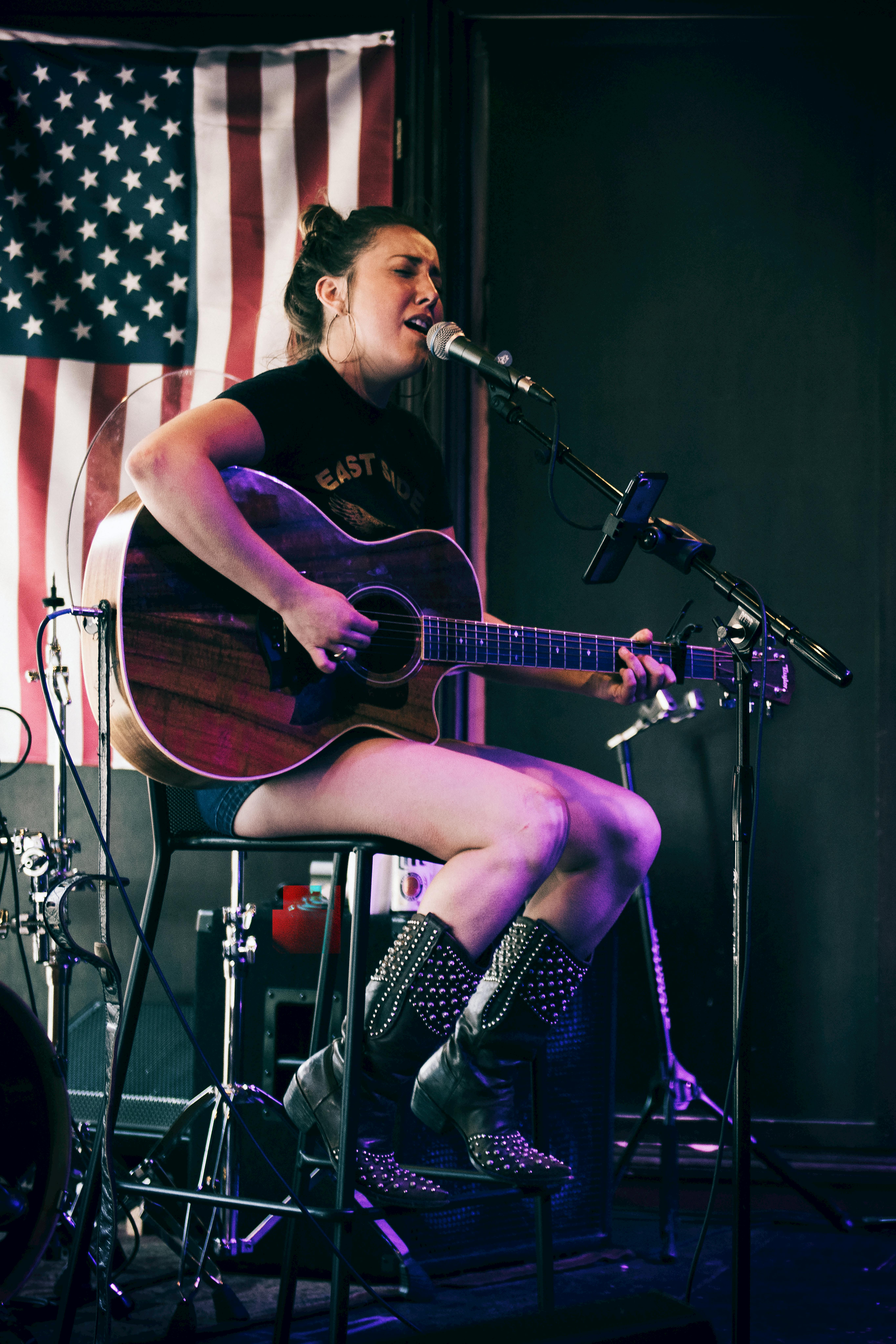 Woman Performing On Stage · Free Stock Photo