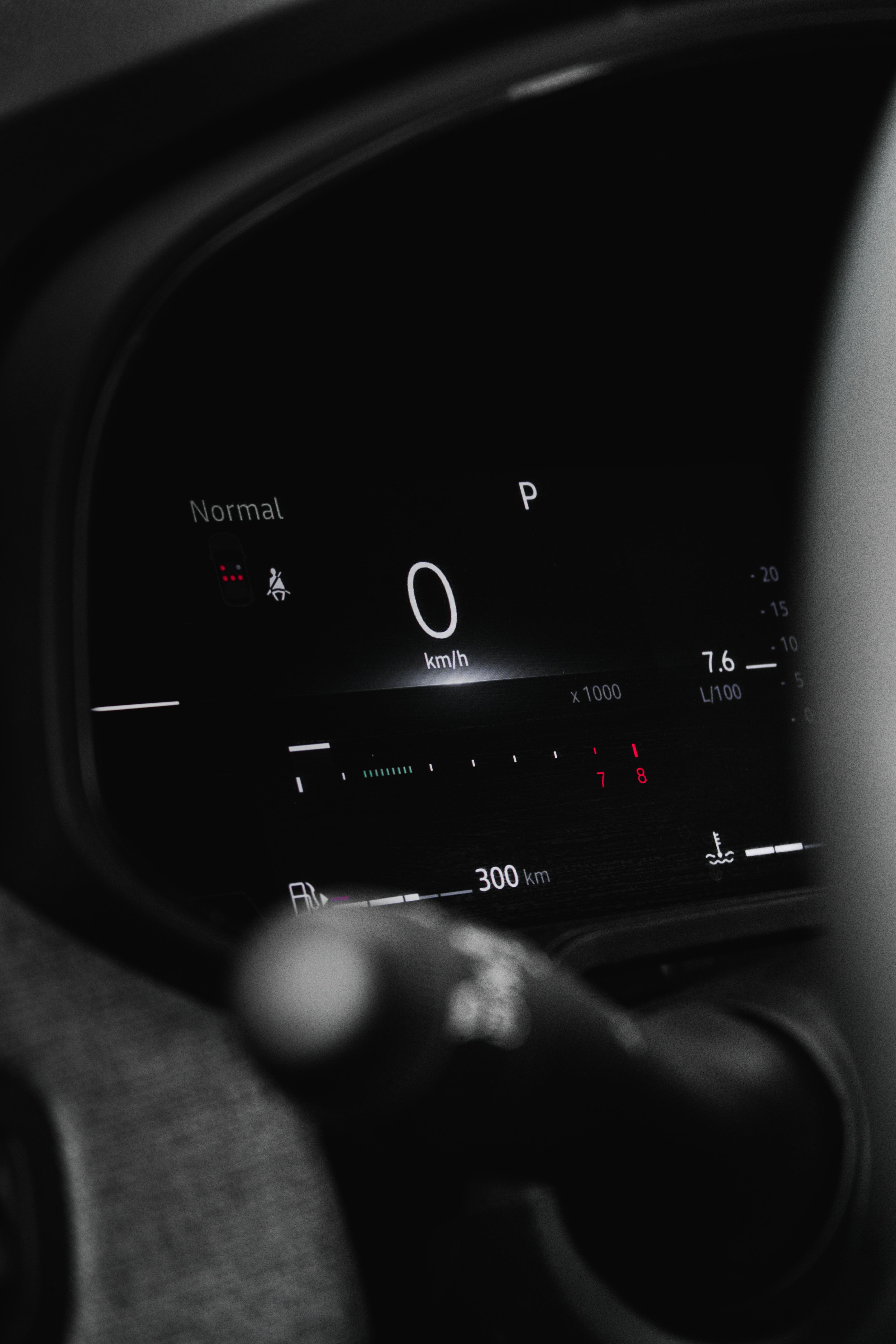Free Close-up view of a modern car dashboard showing digital speedometer and controls. Stock Photo