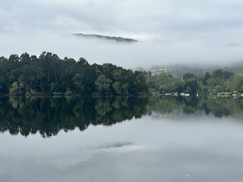 A foggy river Minho with a mountain in the background, Eiras, O Rosal, Galicia, Spain, April 2023 