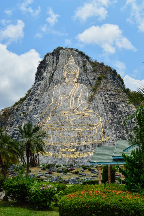 Rock Formation With Buddha Artwork