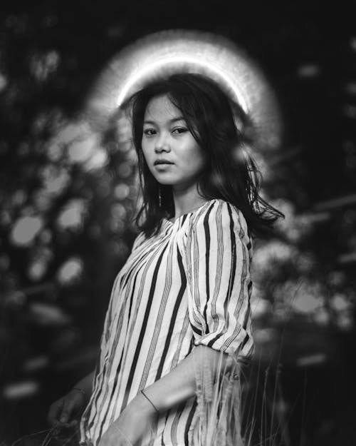 Grayscale Photo of Woman Wearing Stripe Top