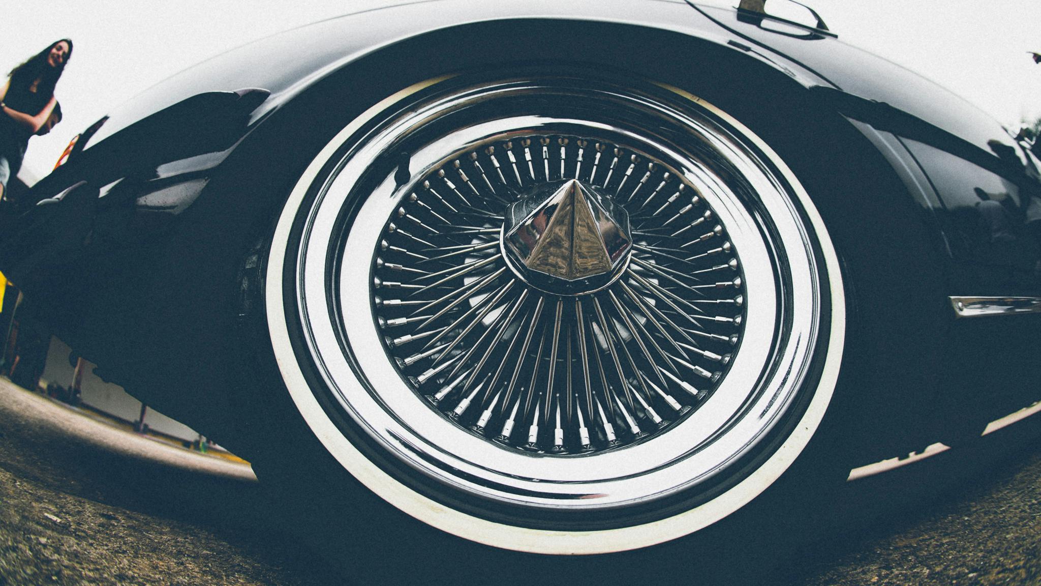 Chrome Wire Wheel And Tire Free Stock Photo chrome-wire-wheel-and-tire-free-stock-photo