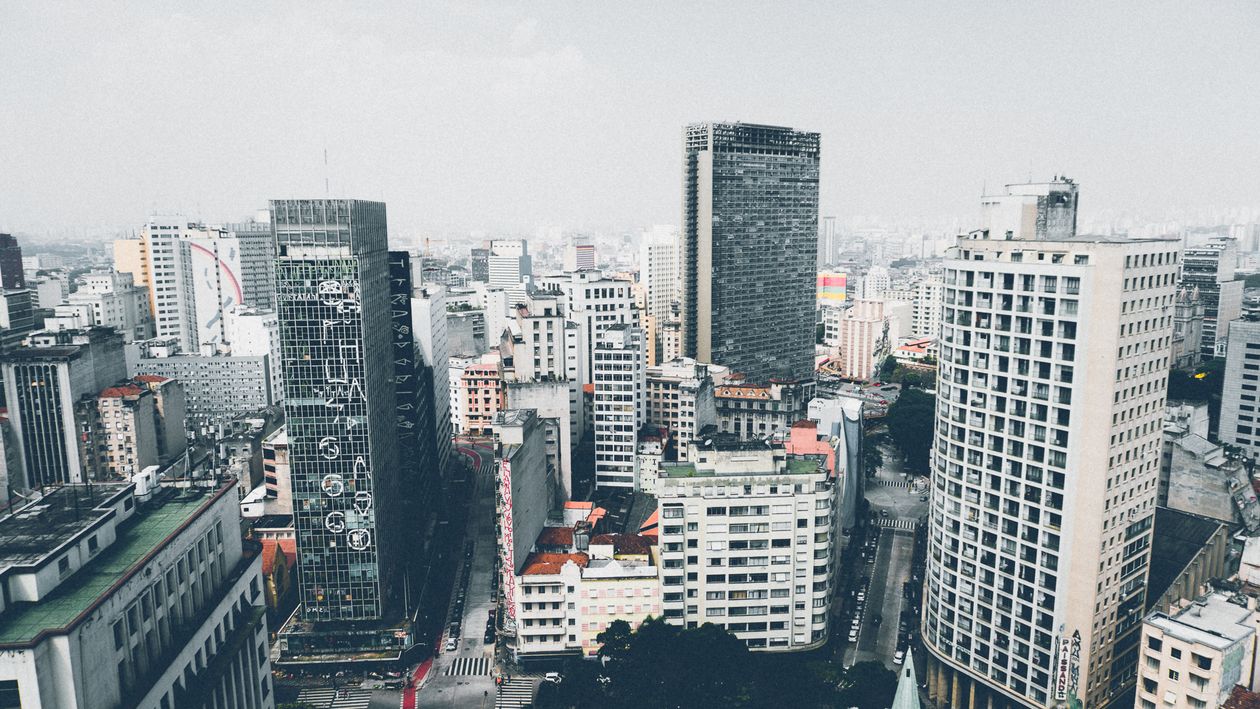 Aerial view of a city skyline with office towers