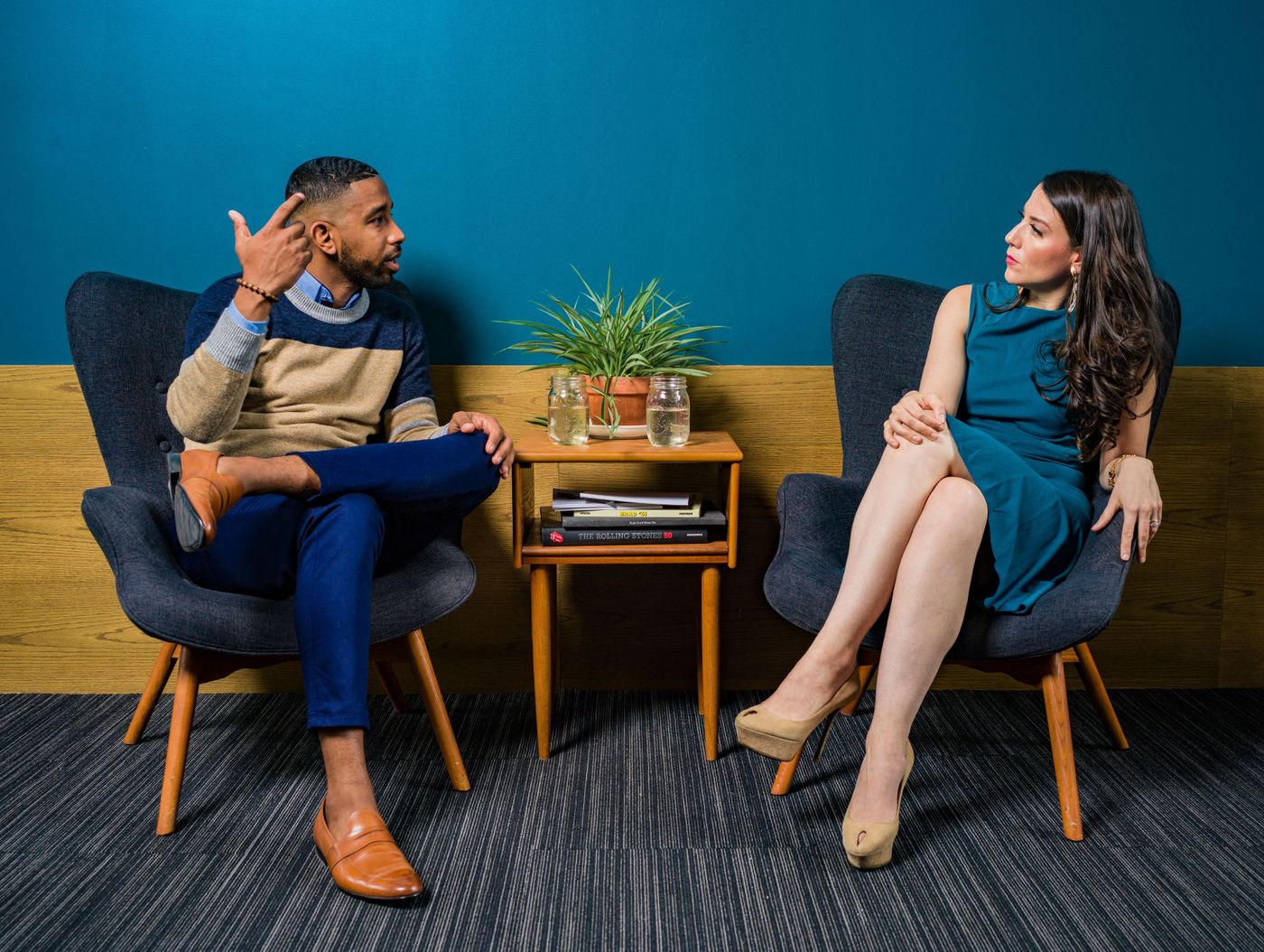 Two professionals in discussion in a modern room