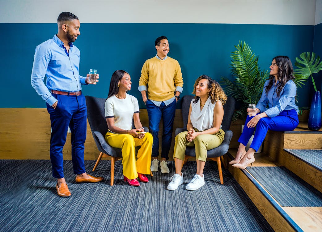 Free Group of People Near Wall Stock Photo