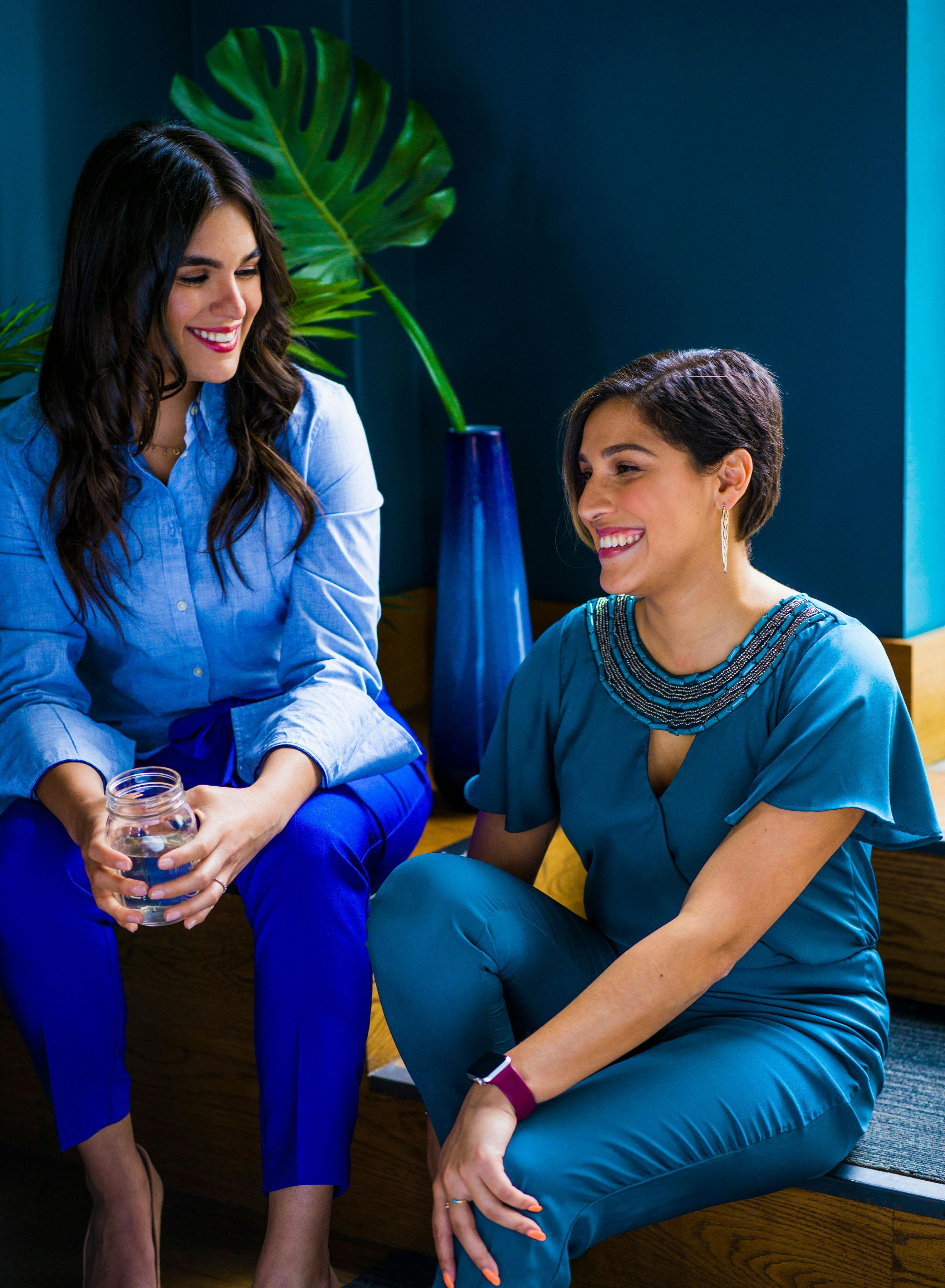 photo of two women sitting