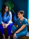 Photo of Two Women Sitting