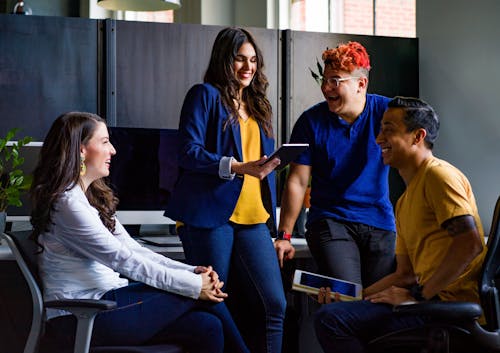 Free Group of People Sitting Inside Room Stock Photo