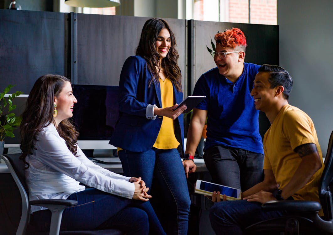 Free Group of People Sitting Inside Room Stock Photo